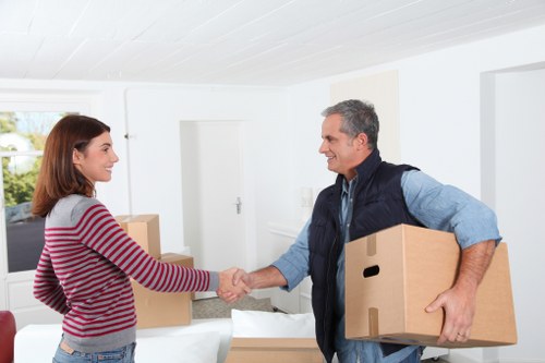 Professionals packing items in West Hampstead storage facility